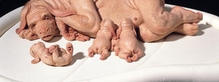 Patricia Piccinini, The Young Family, 2002. Silicone, fibreglass, leather, human hair, plywood, 85cm high x 150cm long x 120cm wide approx. Courtesy of the artist, and Tolarno Galleries, Melbourne, Roslyn Oxley9 Gallery, Sydney and Haunch of Venison, London.