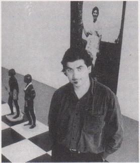 Nicholas Tsoutas in front of Gordon Bennett's installation, Psycho(d)rama, 1990. Institute of Modern Art, Brisbane. Photo: John O'Brien.