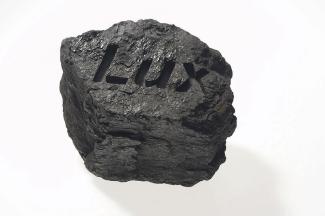Lux. A computer routered sculpture made with coal sourced from the last run of the S.S. Forceful, the last coal-burning tug on the Brisbane River. Exhibited at Queensland Centre for Photography, 2006,  Logan Art Gallery, 2009. Courtesy the artist.