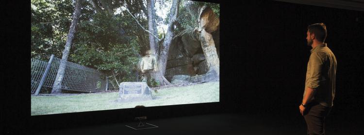 Cheryl L’Hirondelle, nîpawiwin Dharawal ohci (standing up for the Dharawal), 2016. Installation views. Video loop, processing code, Kinect camera, data projection, plinth, screen, light, audience participation. Commissioned by Campbelltown Arts Centre. Courtesy Campbelltown Arts Centre. Photograph Simon Hewson.