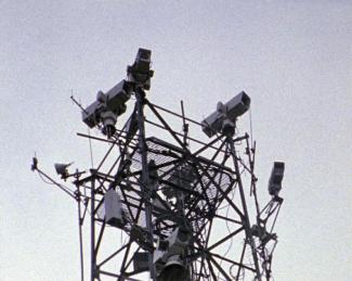 Chapter and Verse, 2005. 16mm film-frame. CCTV mast, ’Derry, Co Derry, 16th December 2003. 
