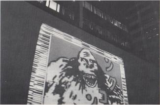 Peter Callas, Untitled, 1988. Slide projection onto State Health Building, Brisbane. Photograph: James Creagh.
