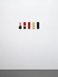 SCALE FROM THE TOOL (SABCO), 1977. Enamel, gold foil on wood, paintbrush, five units 27 x 9 x 2cm (each). Collection the artist. Courtesy Yuill | Crowley, Sydney.