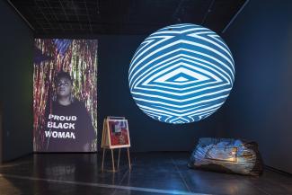 Destiny Deacon and Virginia Fraser, Something in the air, 2016; Brook Andrew, The weight of history, the mark of time (sphere), 2015; installation view, Sovereignty, Australian Centre for Contemporary Art, Melbourne. Photograph Andrew Curtis.